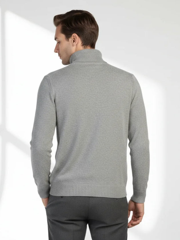 Soft pearl cashmere turtleneck knit from Valoriani showing natural drape and structure